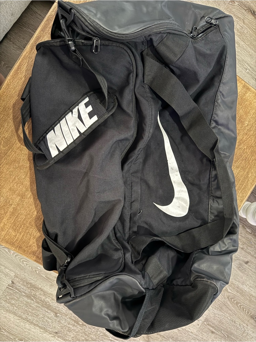 Nike Black Duffel Bag with White Swoosh and Logo